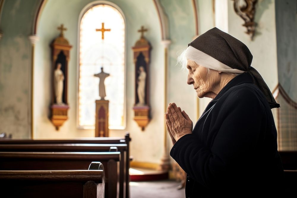 Old woman praying adult spirituality architecture. 