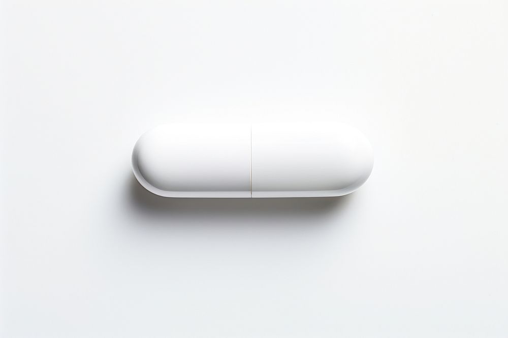 Pill capsule white white background.