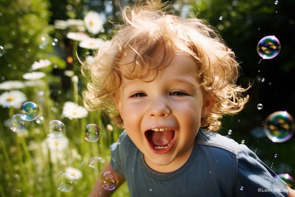 Children boy laughing portrait outdoors. AI generated Image by rawpixel.