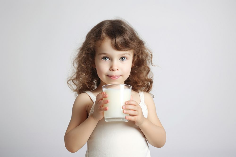 Children girl drinking milk portrait. AI generated Image by rawpixel.