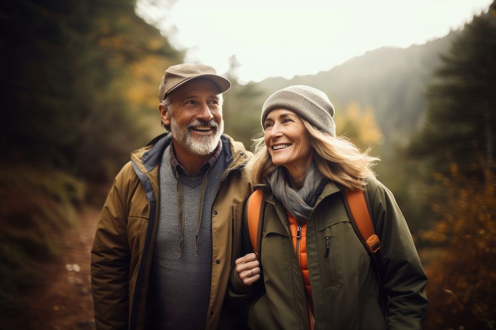 Mature american couple walking mountain portrait.