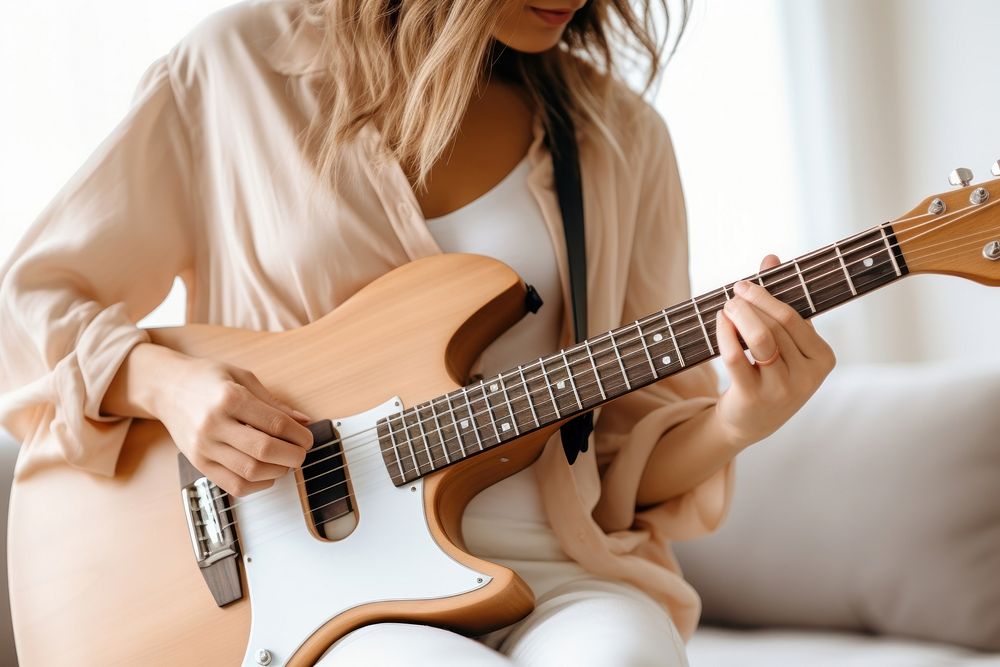 Playing guitar musician adult woman. AI generated Image by rawpixel.