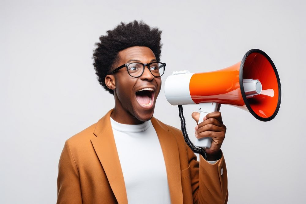 Cheerful Black Guy Shouting In Loudspeaker shouting cheerful adult. AI generated Image by rawpixel.