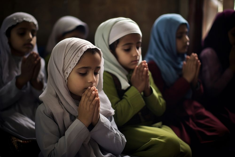Children pray adult spirituality togetherness. AI generated Image by rawpixel.