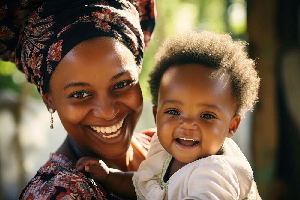 Black woman baby laughing portrait. 