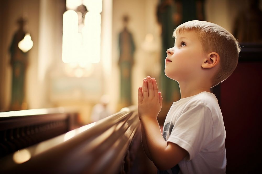 Portrait praying child photo. AI generated Image by rawpixel.