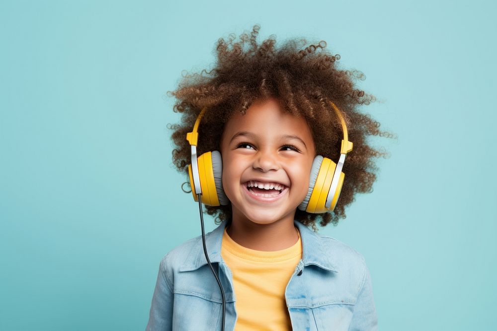 Kids wearing headphone headphones headset smiling. AI generated Image by rawpixel.