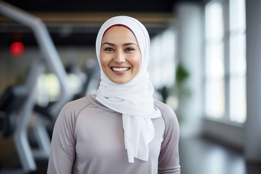 Muslim woman smiling smile scarf. AI generated Image by rawpixel.