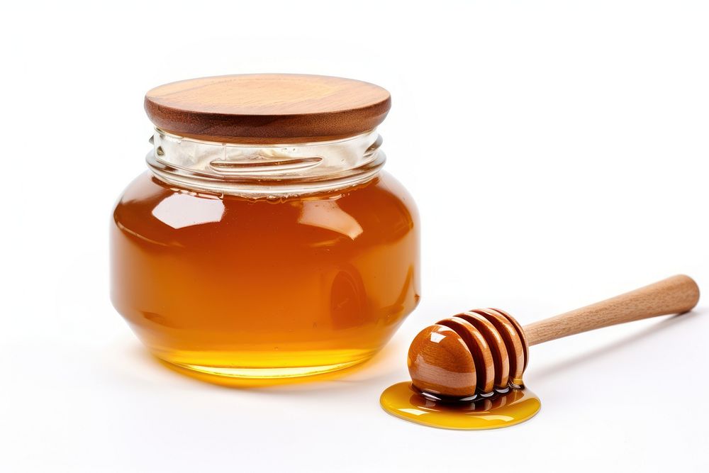 Honey dipper jar white background freshness. 