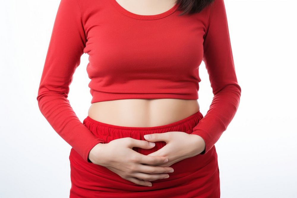 Woman clutching stomach sleeve anticipation midsection. 