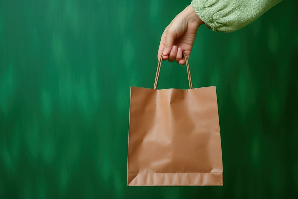 Paper bag handbag green accessories. 