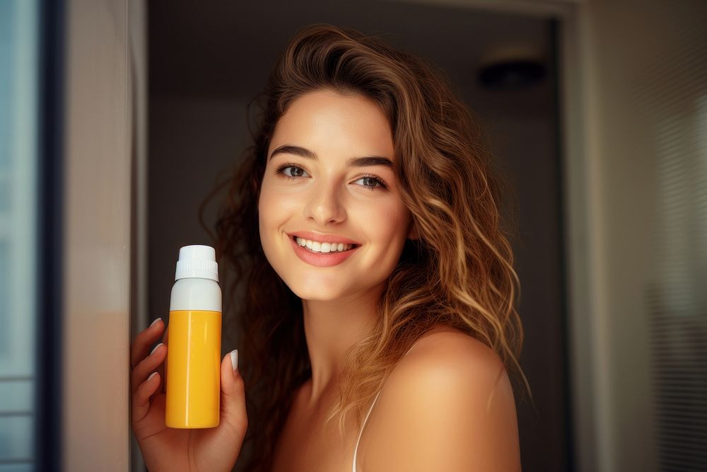 Sunscreen bottle cosmetics portrait. 