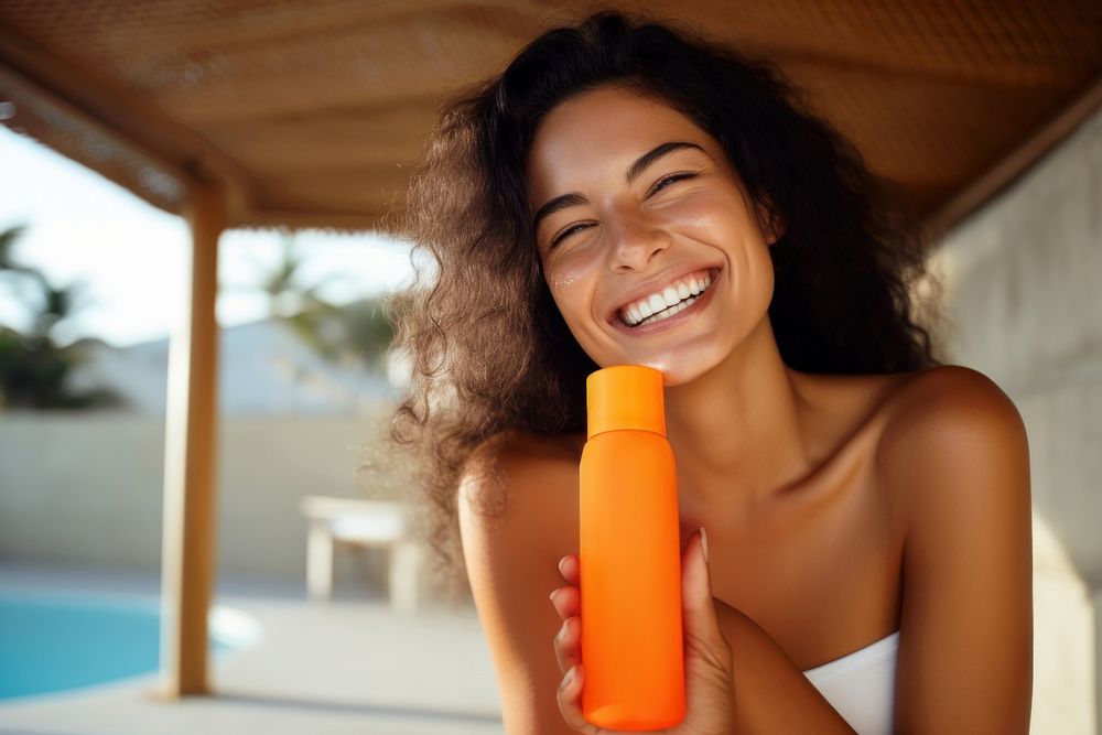 Sunscreen laughing bottle smile. 