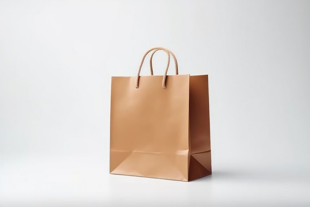 Shopping bag handbag paper white background. AI generated Image by rawpixel.