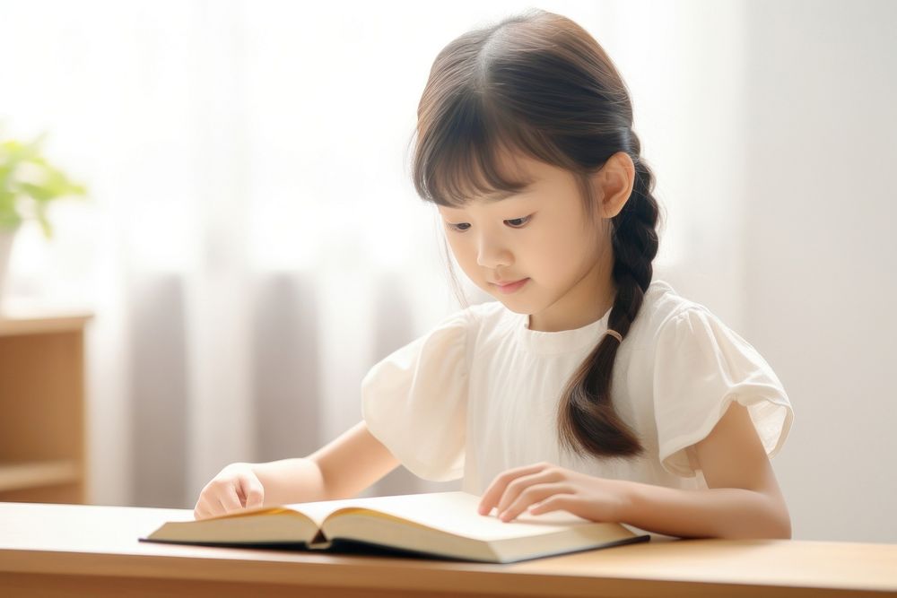 Asian kid girl reading student child. 