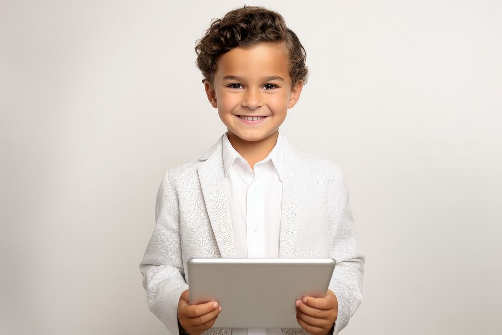 Kid holding tablet computer portrait smile. AI generated Image by rawpixel.