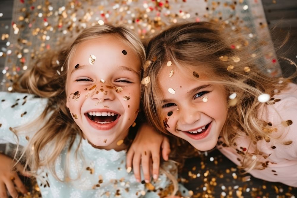 Laughing confetti child smile. AI generated Image by rawpixel.