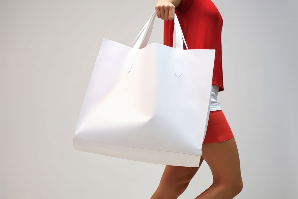 Shopping bag handbag adult white. AI generated Image by rawpixel.