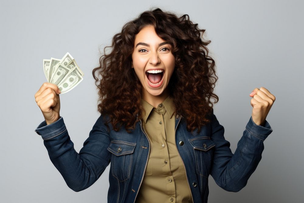 Young women money cheerful laughing. AI generated Image by rawpixel.