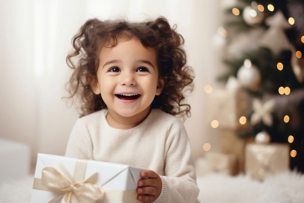 Christmas cheerful laughing toddler. AI generated Image by rawpixel.