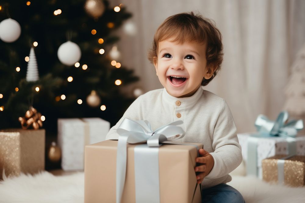 Christmas cheerful toddler gift. AI generated Image by rawpixel.
