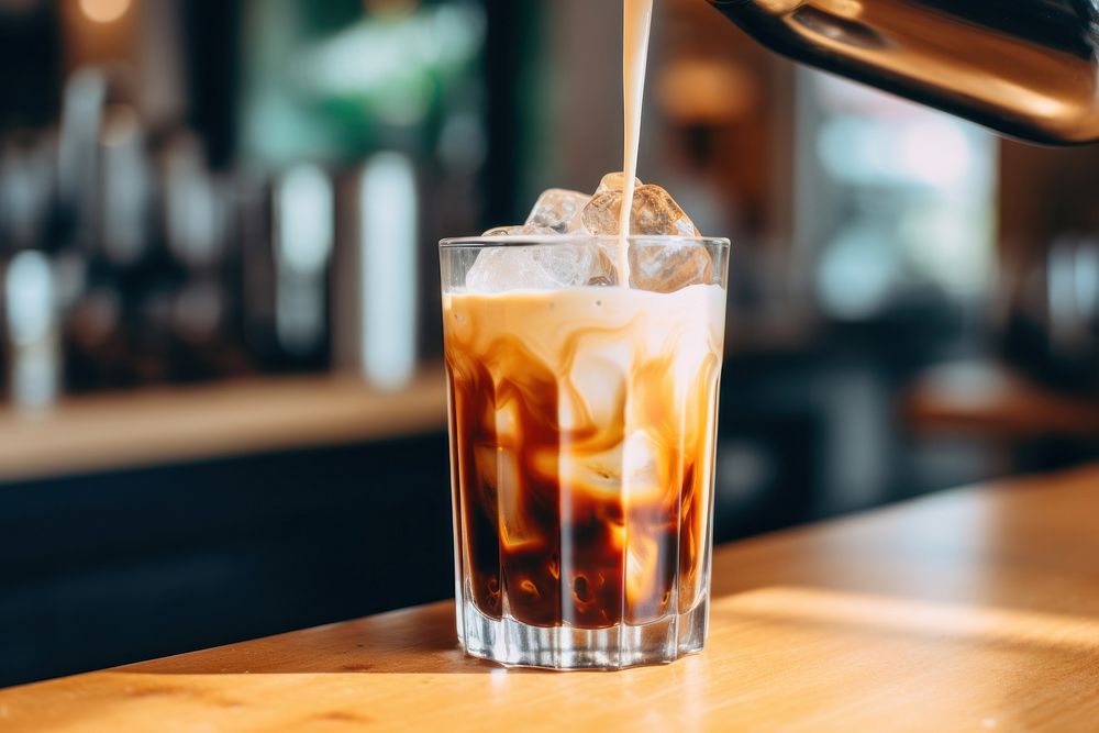 Iced coffee drink glass milk. AI generated Image by rawpixel.