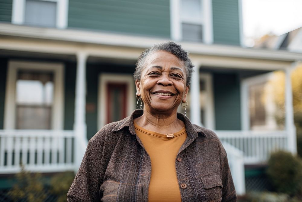 Smiling african american woman standing portrait adult. 