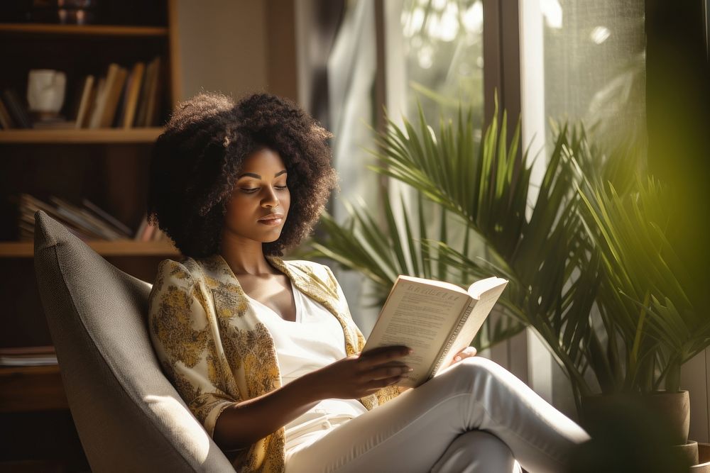 Reading book publication armchair adult. 