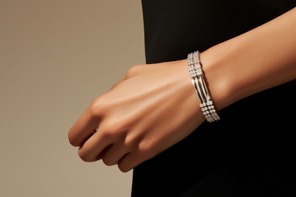 Diamond bracelet jewelry ring hand. AI generated Image by rawpixel.