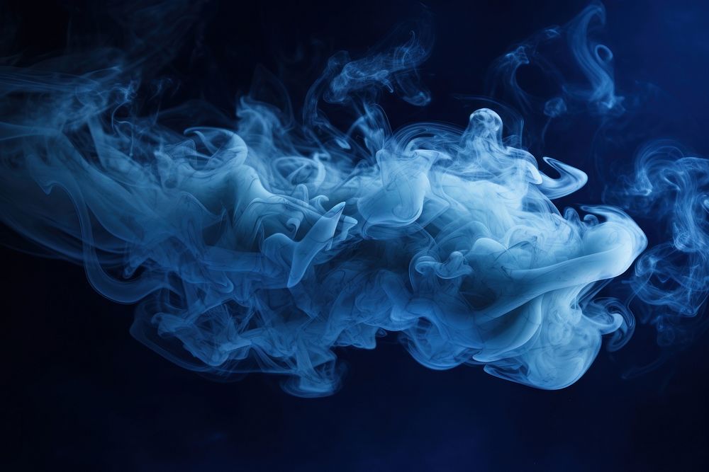 Dark blue cloudy smoke backgrounds cigarette abstract. 