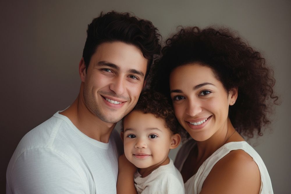 Mixed race family portrait adult photo. AI generated Image by rawpixel.