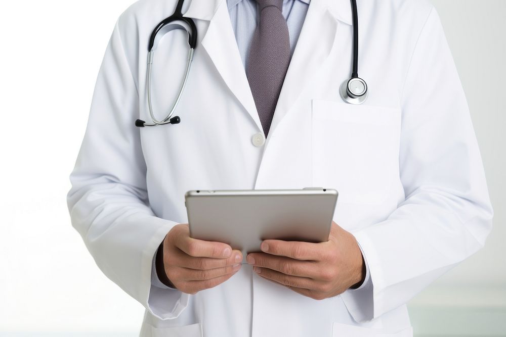 Doctor holding digital tablet computer stethoscope electronics. 