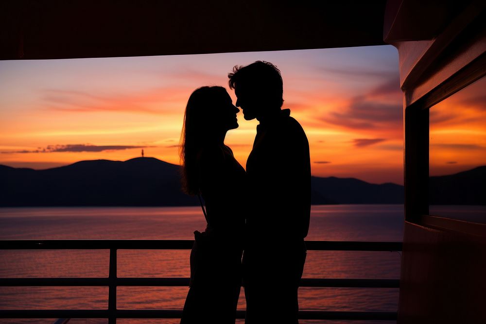 Silhouette outdoors kissing sunset. 