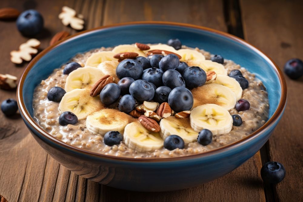 Breakfast oatmeal porridge breakfast blueberry banana. AI generated Image by rawpixel.