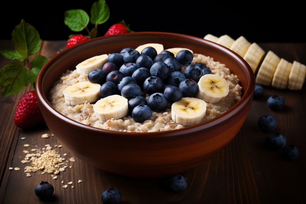 Breakfast oatmeal porridge breakfast blueberry berries. AI generated Image by rawpixel.