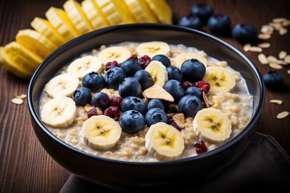 Breakfast oatmeal porridge breakfast banana food. AI generated Image by rawpixel.