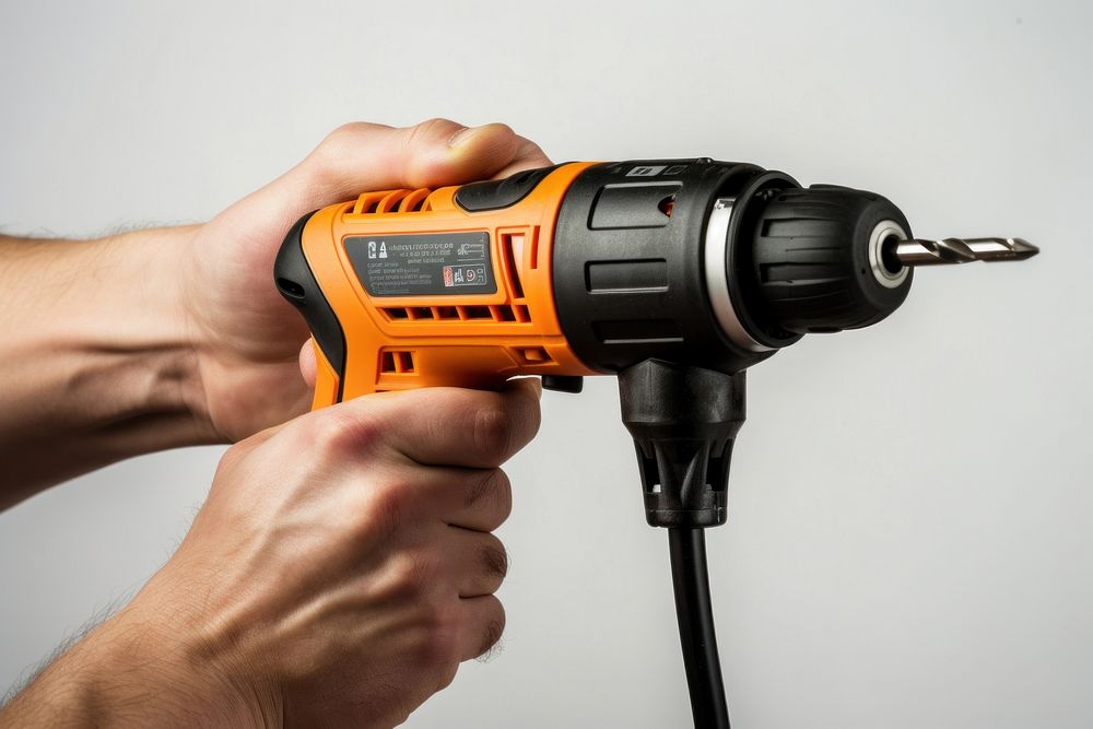 Electric screwdriver holding tool hand. 