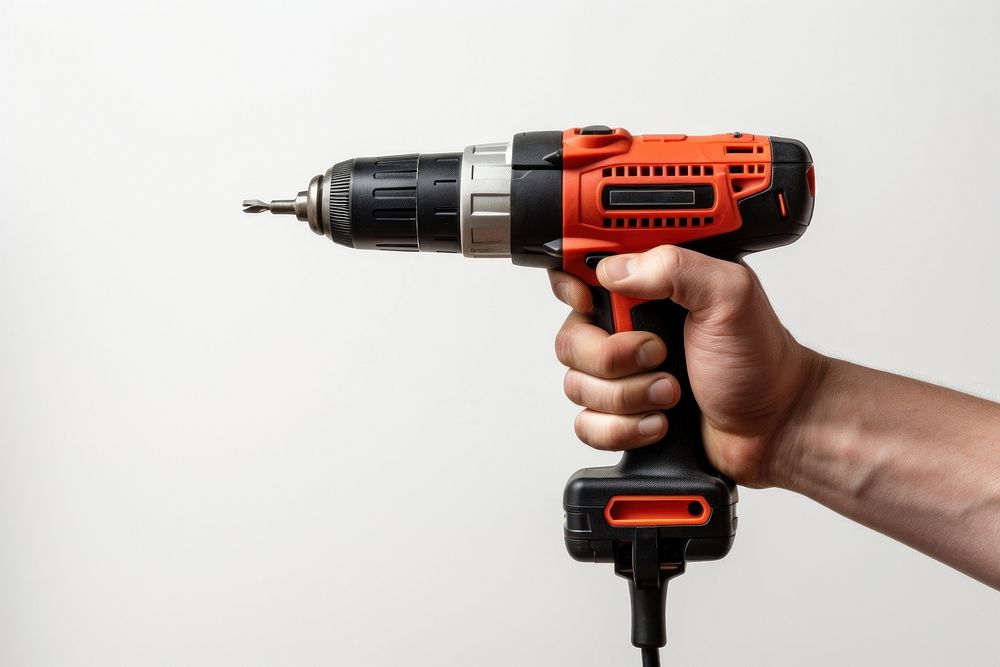 Electric screwdriver holding tool hand. AI generated Image by rawpixel.
