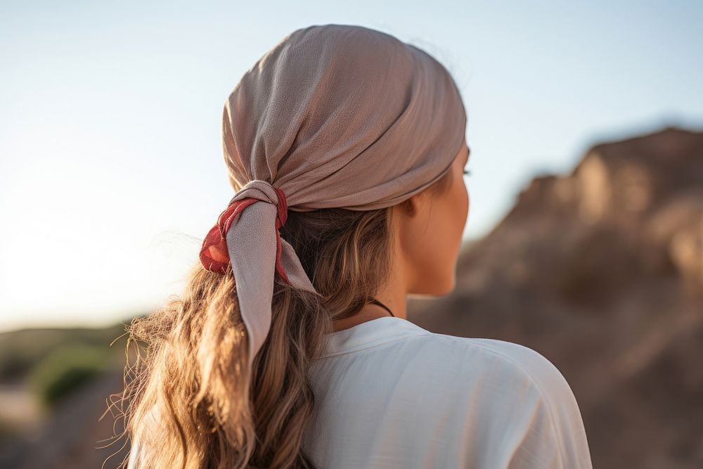 Woman wearing Hair Scarf outdoors adult scarf. 