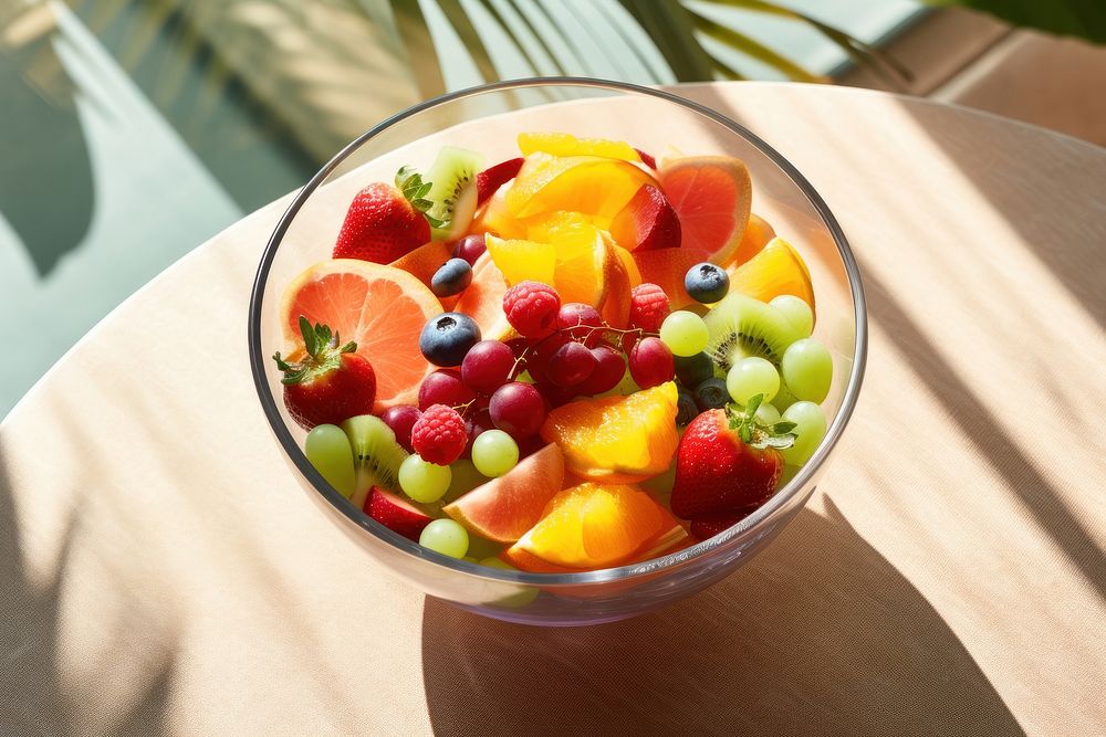 Fresh fruit salad bowl dessert table. AI generated Image by rawpixel.