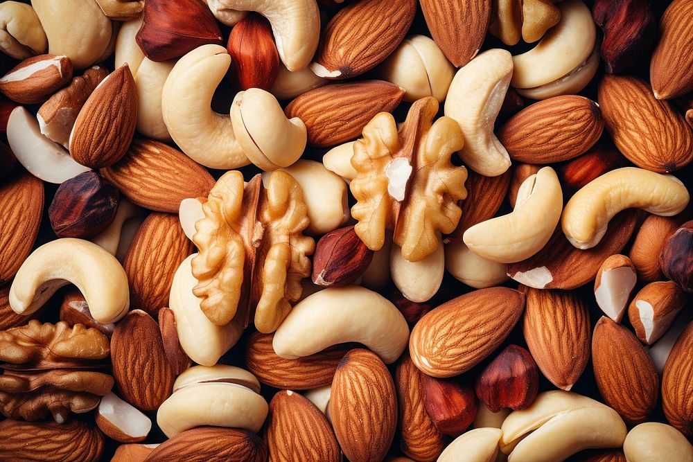 Mixed nuts food backgrounds abundance. AI generated Image by rawpixel.