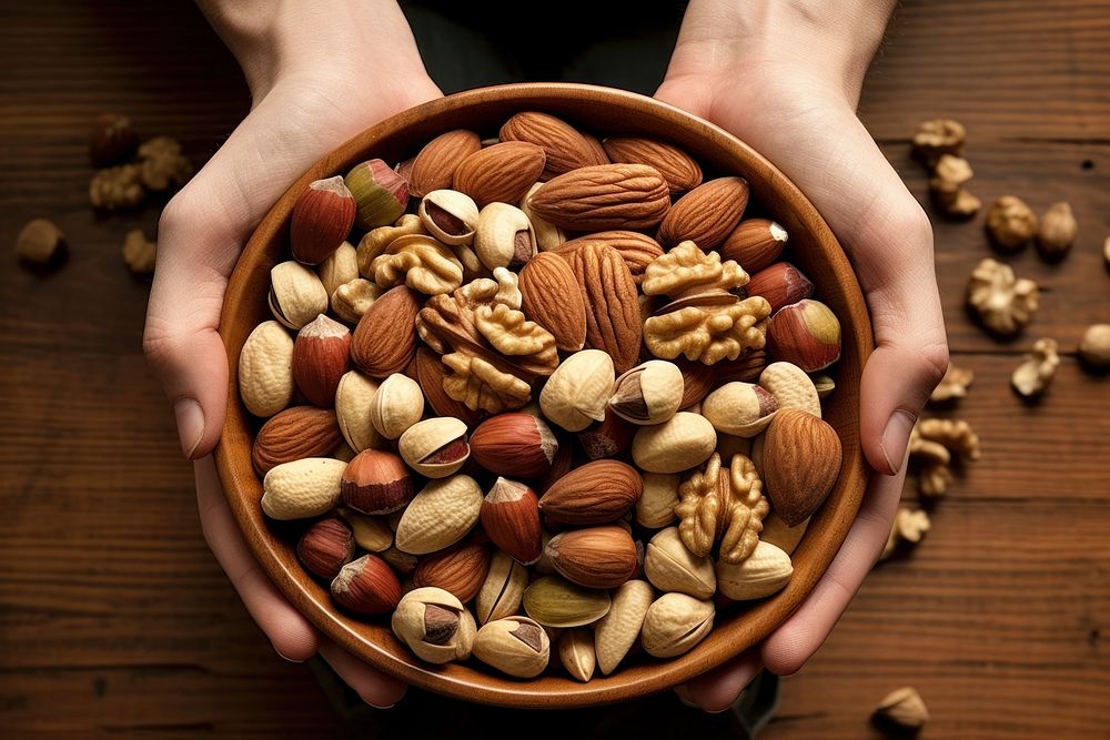 Mixed nuts food bowl ingredient. AI generated Image by rawpixel.
