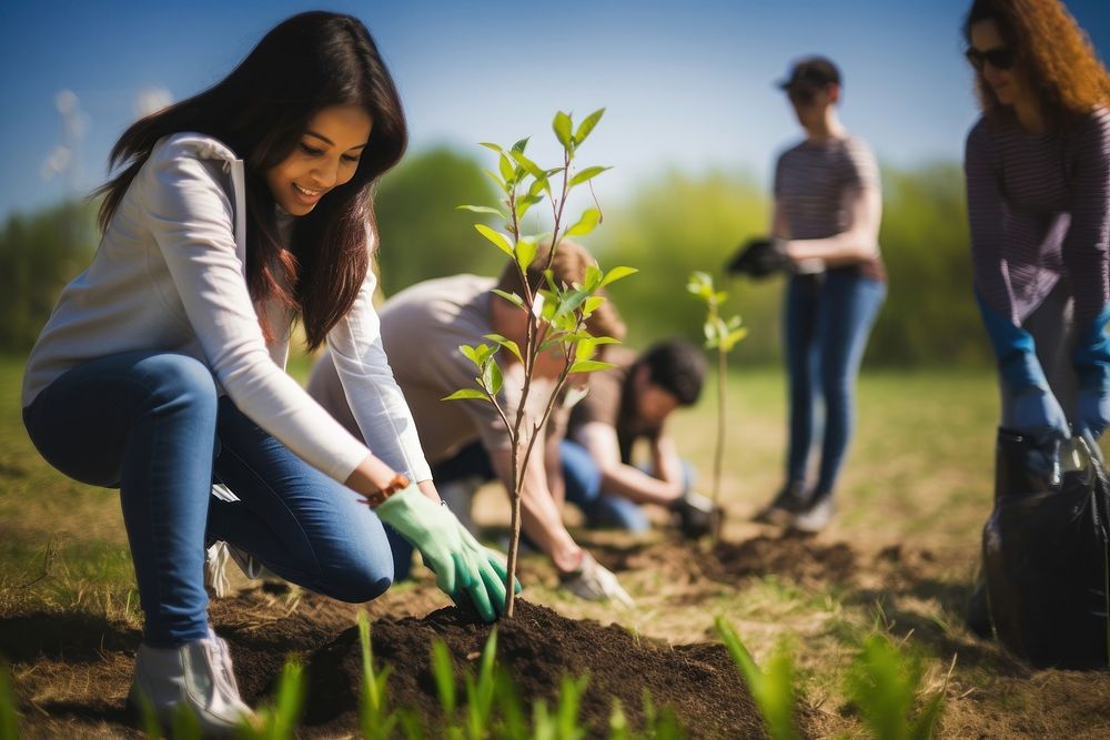 People planting tree environmentalist gardening outdoors. AI generated Image by rawpixel.