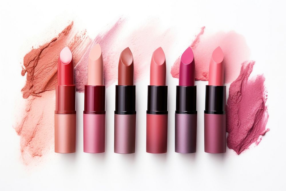 Cosmetics swatches beauty products lipstick white background arrangement variation. 