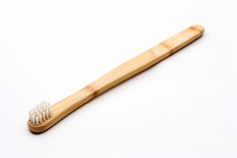 Bamboo toothbrush tool white background silverware. AI generated Image by rawpixel.