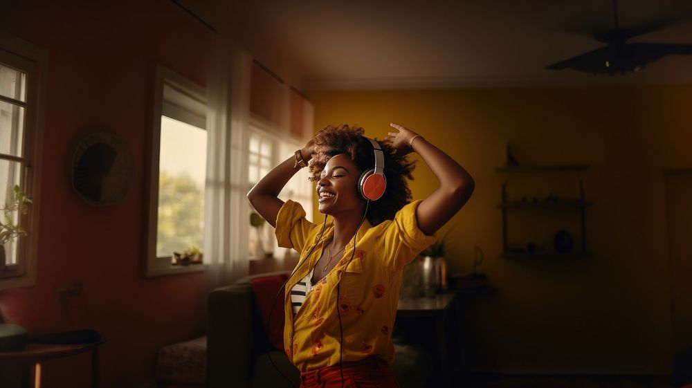 Woman dancing headphones yellow adult. AI generated Image by rawpixel.