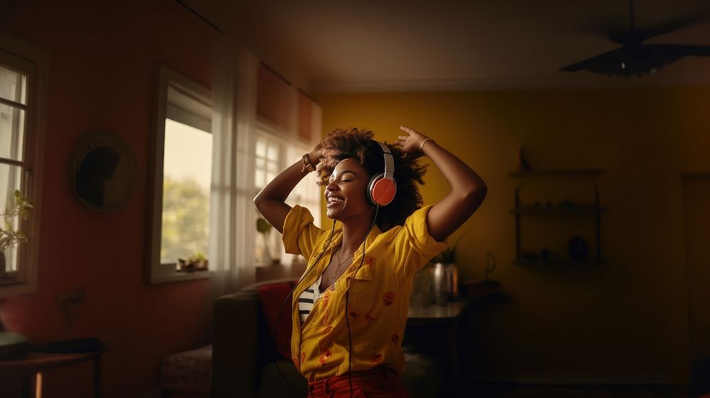 Woman dancing headphones yellow adult. 