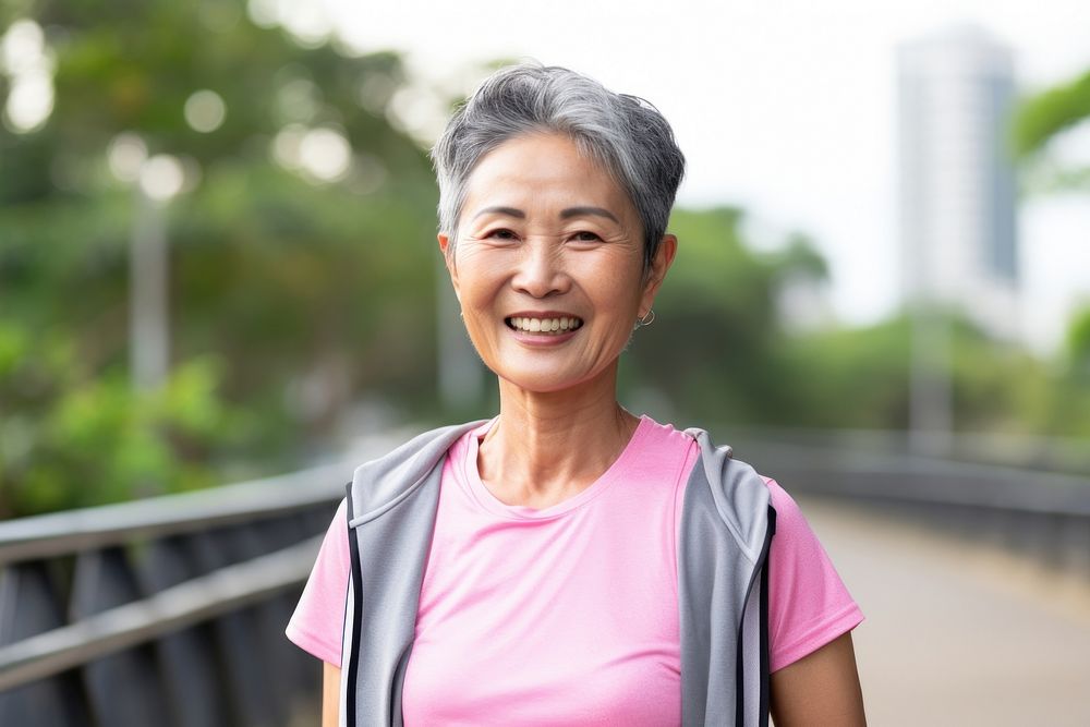 Senior Thai woman smiling smile architecture. AI generated Image by rawpixel.