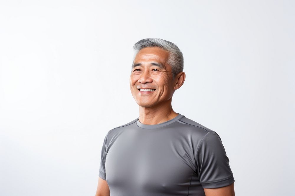 Senior Thai man portrait smiling t-shirt. 