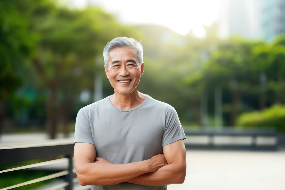 Senior Thai man smiling adult smile. AI generated Image by rawpixel.
